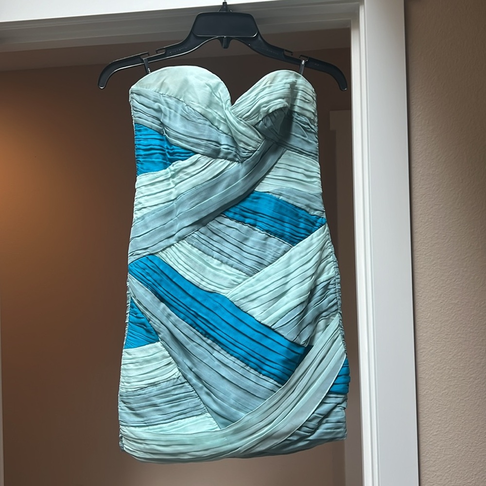 Gorgeous blue color block 100% silk dress. BEBE size XS